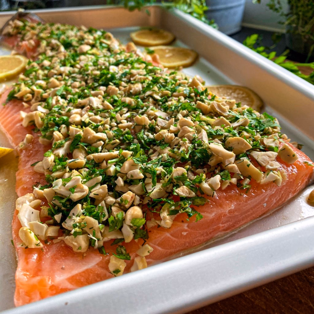 Hvor længe skal en lakseside have i ovnen?