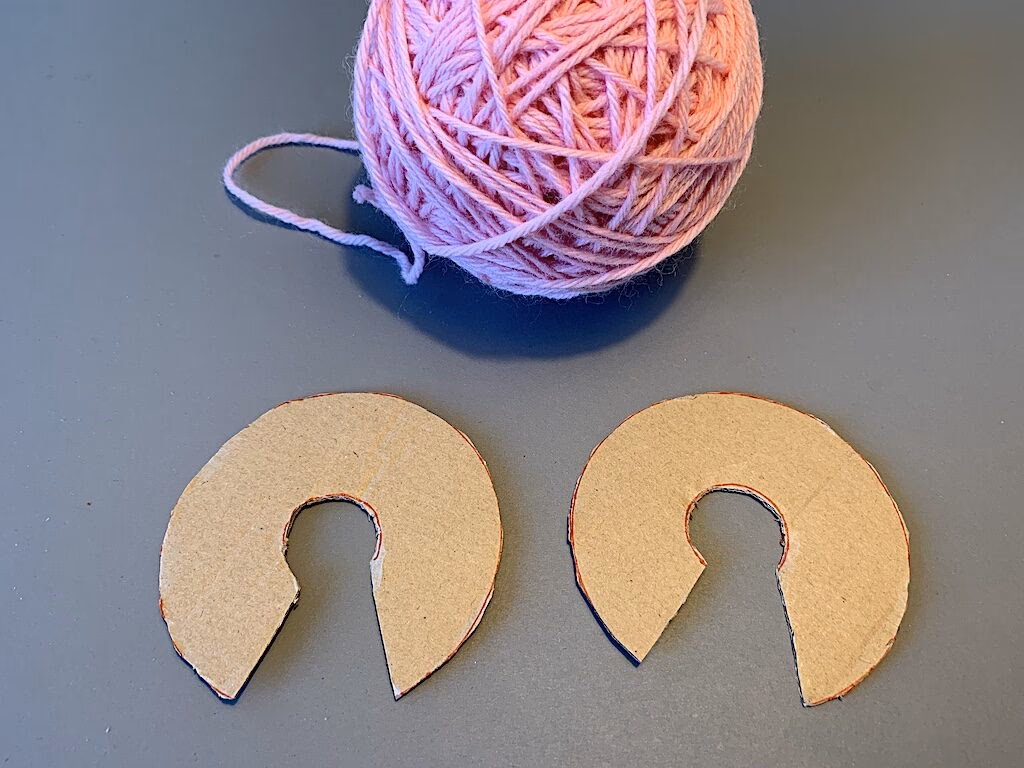 Hvordan bruger man en pompon maker?