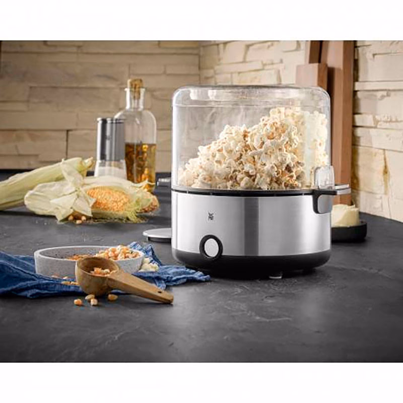 Hvordan laver man popcorn i en maskine?