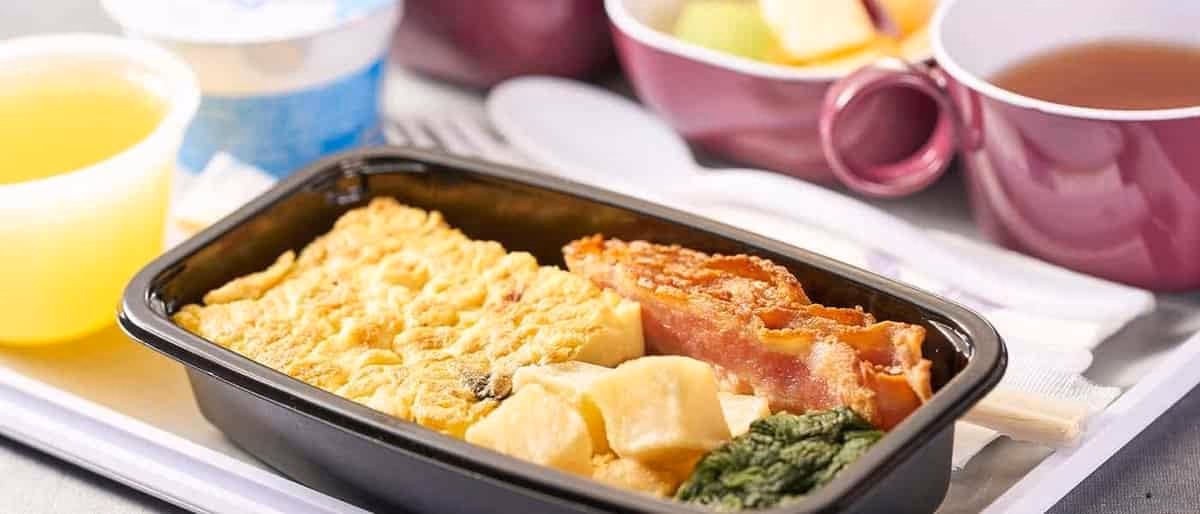 Hvad koster det at opgradere til business class hos Thai Airways?